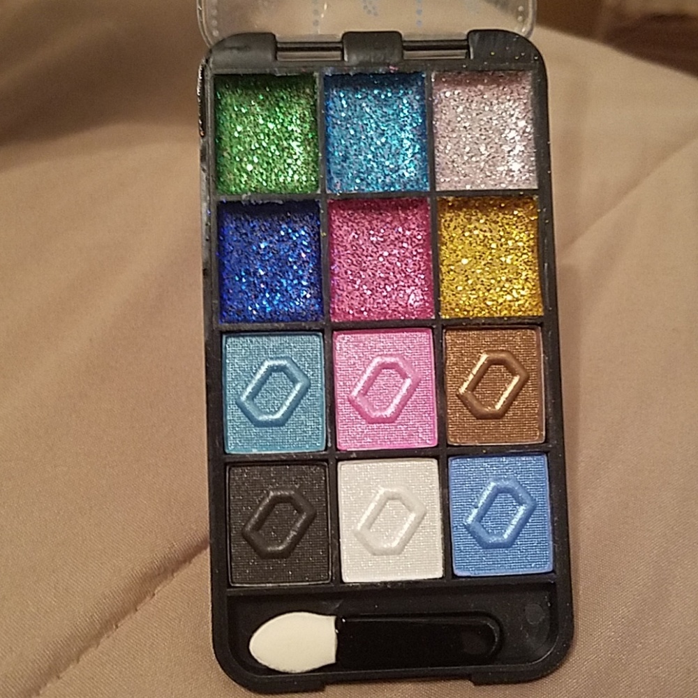 NIP pocket sized glitter eyeshadow palette